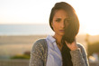 © blvdone - Young Indian woman serious face sunset