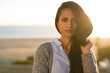 © blvdone - Young Indian woman serious face sunset