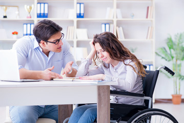 Disabled student studying and preparing for college exams