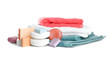Set of different towels and soap bars on white background