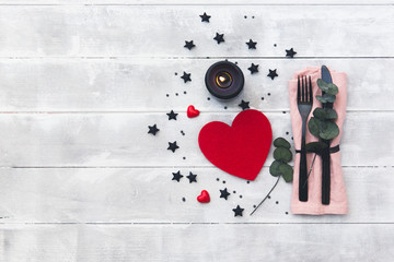 Wall Mural - Valentines day table setting. cutlery over wooden background. Romantic concept