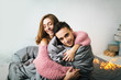 © stakhov - Young couple hugging at home. Artwork. Soft focus