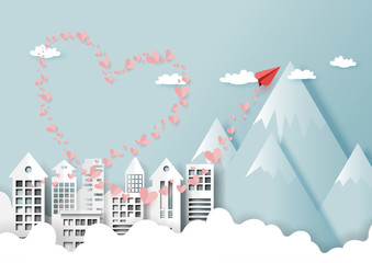 Wall Mural - Paper art style of valentine's day greeting card and love concept.Red paper airplane flying on urban city landscape with mountains, clouds and blue sky.Vector illustration.