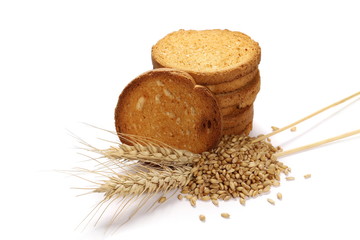 Wall Mural - Rusks with integral wholewheat flour, bread slices, ears of wheat and grains isolated on white background