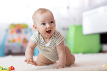 Crawling Funny Baby Boy Indoors At Home
