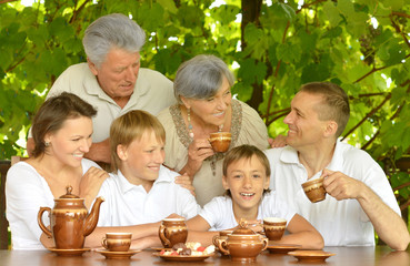 Wall Mural - Happy family in summer park