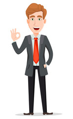 Wall Mural - Handsome businessman in suit showing ok sign