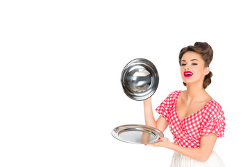 Wall Mural - beautiful young woman in retro clothing with empty serving tray in hands isolated on white