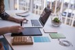 © Wavebreak Media - Female graphic designer using graphics tablet at desk