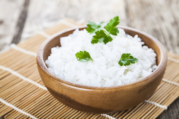 Boiled rice in a wooden bowl