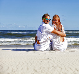 Valentine day on beach and two lovers 