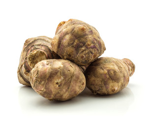 Wall Mural - Jerusalem artichoke heap isolated on white background sweet crisp topinambur.