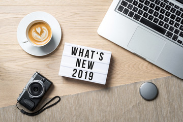 Wall Mural - What's new 2019 written on lightbox in office as flatlay