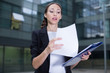 © JackF - Businesswoman is examining documents