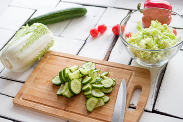 Wall Mural - Vegetables lie on a table on a chopping board