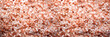 Pink himalayan salt background. Ingredients for cooking. Banner