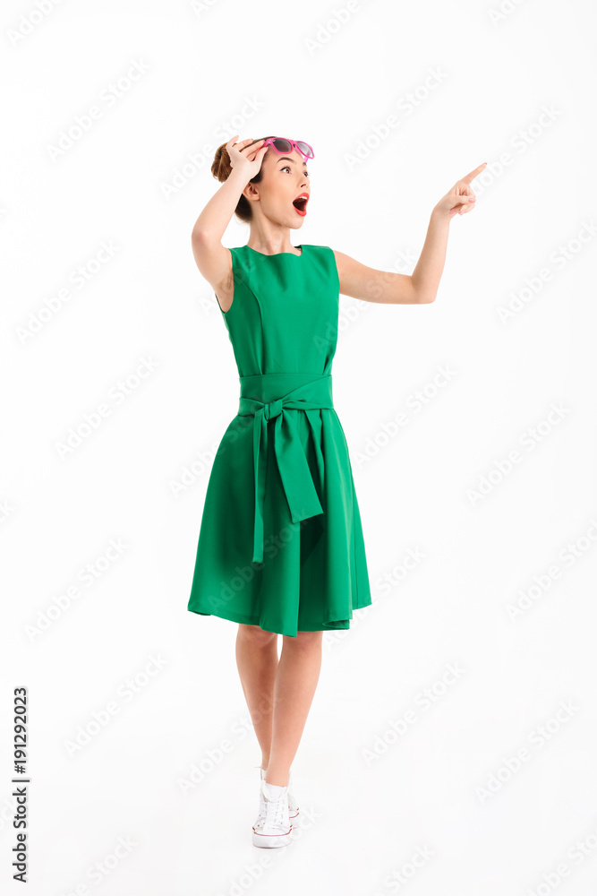 Full length portrait of a surprised young girl Stock Photo | Adobe Stock