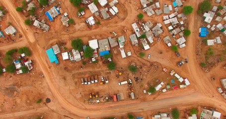 a bird's-eye view taken over a city with ruined houses in namibia, africa. the poor people live in t