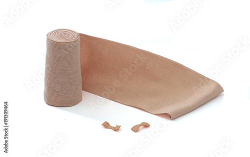 Fotografía Elastic compression bandage roll on white background