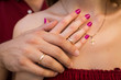 © Yana - Closeup hands of married couple with rings