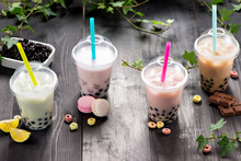 Milky Bubble Tea With Tapioca Pearls In Plastic Cup