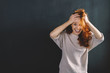 © contrastwerkstatt - Amused young redhead woman laughing