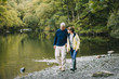 © dglimages - Senior Couple Walking round the Lake District