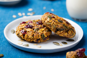 Wall Mural - Pumpkin, oat cookies with cranberries, glass milk