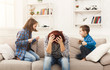 © Prostock-studio - Kids having quarrel over tired mother
