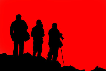  in front of  the volcano light  the  silhouette of tourist