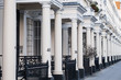 View of the porches of a terrace of Georgian housing in an upmarket district of central London