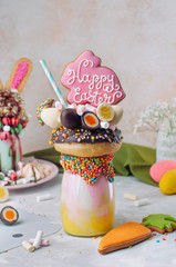 Wall Mural - Easter freak shake decorated with Easter bunny gingerbread on table