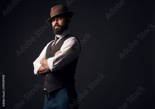 Low Key Portrait Of Attractive Serious Man With Dark Hair