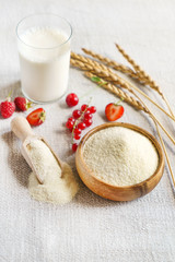 Wall Mural - Raw unprepared semolina in bowl