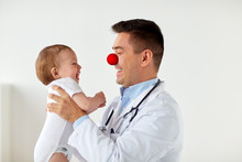 Happy Baby At Doctor On Red Nose Day
