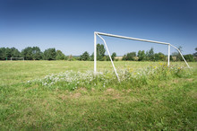 Soccer Field With Blue Sky In The Countryside.