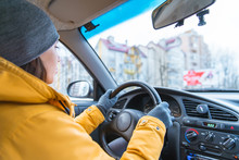 Woman Drive Car In Cold Winter Weather