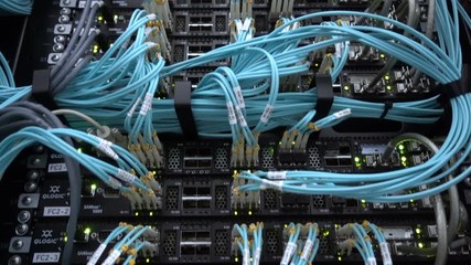 MOSCOW, RUSSIA - February 3: Optical server. Commutator. flashing lights. Optical fiber. Severs computer in a rack at the large data center. on February 3, 2018 in Moscow, Russia. Editorial 