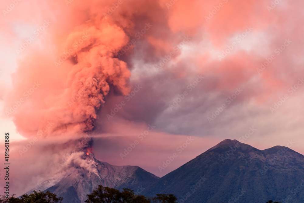 Fuego volcano erupting at dawn, near Antigua, Guatemala - obrazy, fototapety, plakaty 