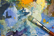 Artists acrylic paint palette close up semi abstract background
