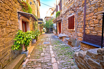 Groznjan cobbled street and old architecture view