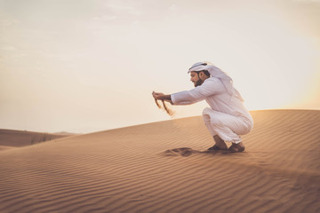 Wall Mural - Arabic man in the desert