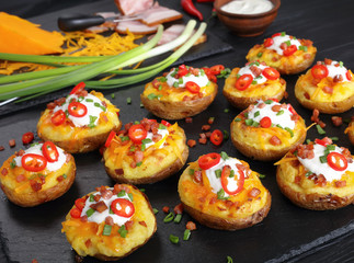 Poster - potatoes loaded with cheese, bacon, cream