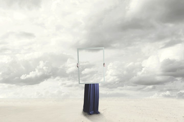 surreal moment of a woman hiding behind a picture of clouds equal to the landscape