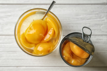 Sticker - Can and bowl with pickled apricots on table