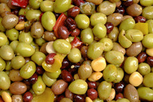 Full Frame Close Up Of Mixed Olives Displayed On A Market Stall In The Dordogne, France