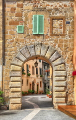 Sticker - old gate and the street in medieval tuff city of Sorano, Tuscany, Italy