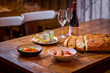 assorted salads in mediterranean restaurant  with focaccia bread on wooden table