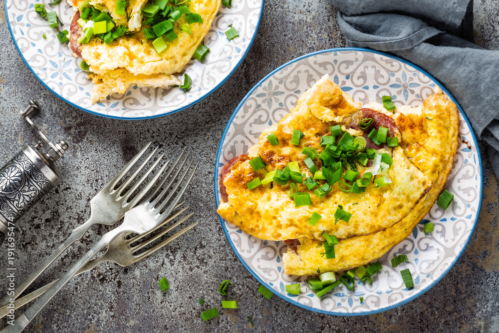 Omelet or omelette with fresh green onion, scrambled eggs - obrazy, fototapety, plakaty 