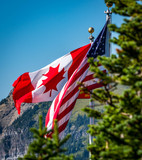 Fototapeta Góry - american and canadian flag 